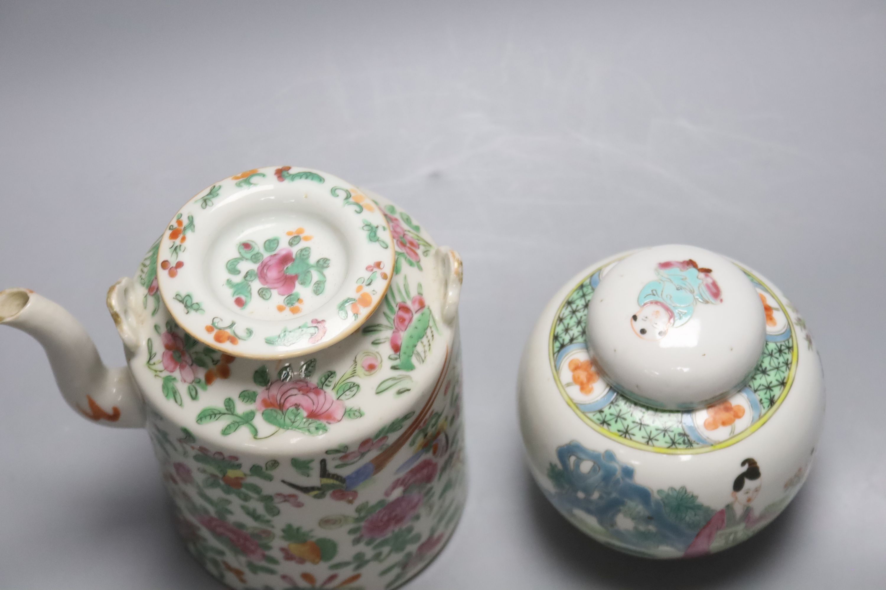 A Chinese famille rose tea pot and a similar jar and cover, tallest 14cm